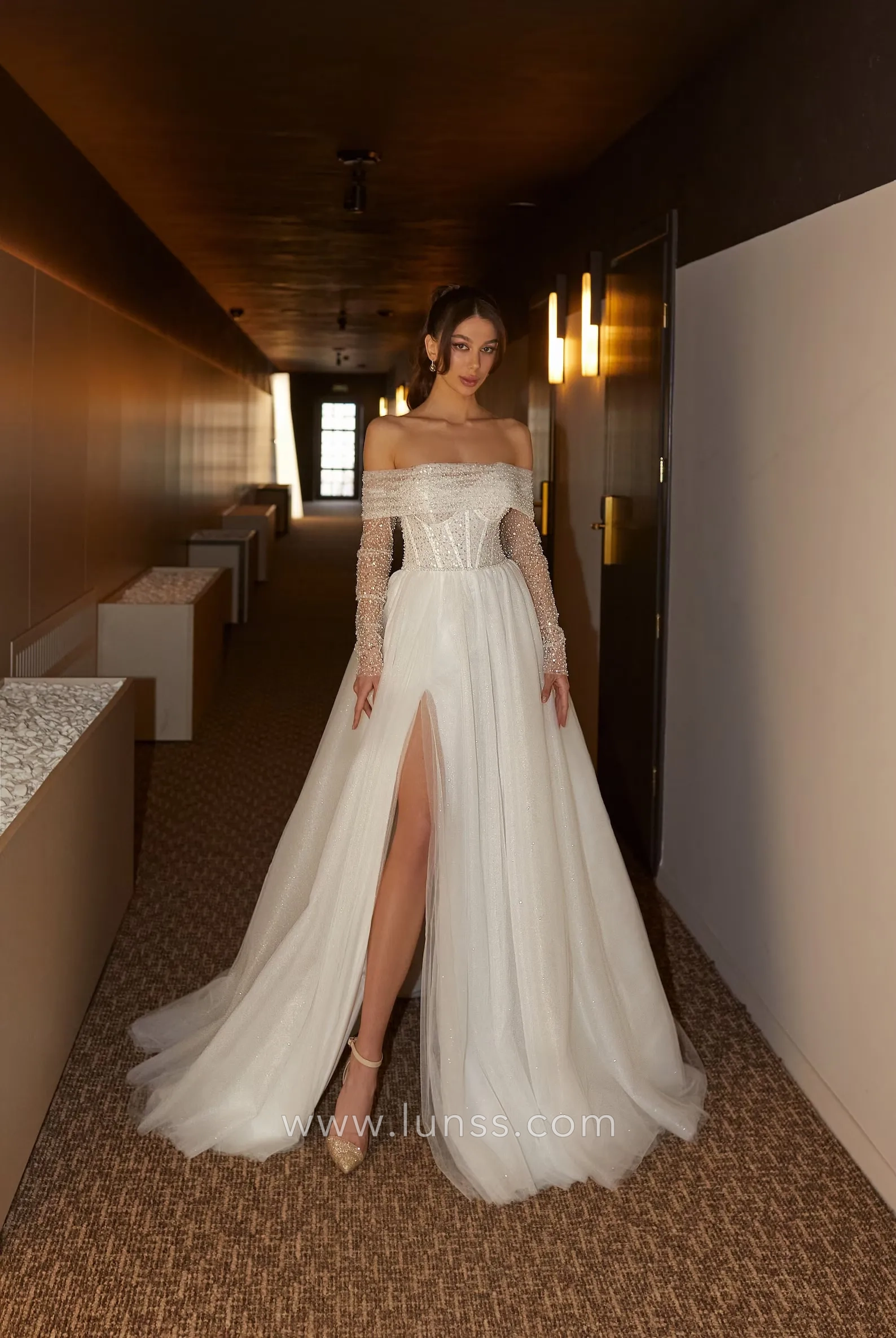 sparkly beading off shoulder long sleeve slit bridal gown