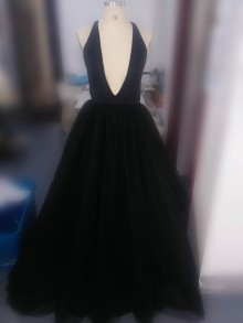 black plunging sleeveless prom dress