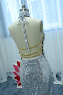 open back with gold metallic straps