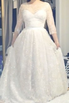 slight sweetheart neckline with floral appliques