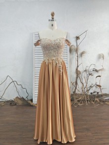 beaded top with shiny bottom one piece prom dress