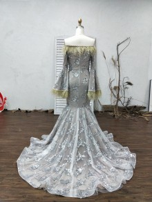 custom designed prom dress with dramatic bell sleeves