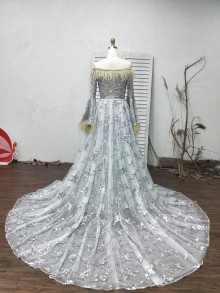 custom senior prom dress with dramatic bell sleeves