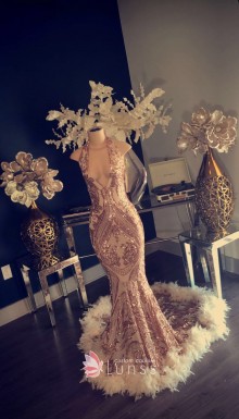 Champagne gold sparkly sequin prom dress with long feather train