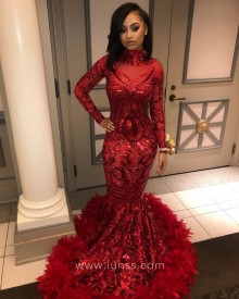red sequin prom dress with feather train
