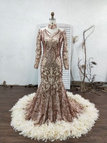 long sleeve high neck gold geometric sequin and feather prom gown