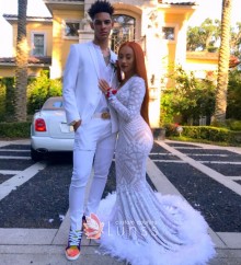 white sequin and feather mermaid dress
