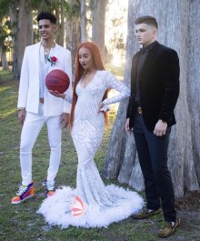 white sequin and feather prom dress