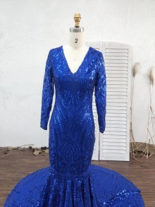 Designer custom made royal blue prom dress with V neckline and long sleeves