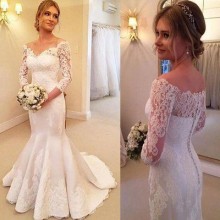 light ivory sheer lace satin trumpet wedding dress inspiration picture
