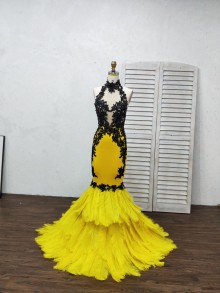 Halter neck black applique yellow feather mermaid prom gown