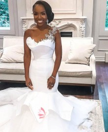 satin wedding dress with appliqued shoulder