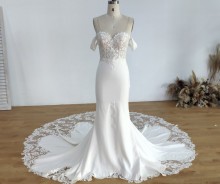 beautiful off the shoulder lace and crepe wedding dress
