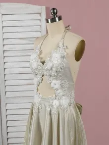 lace appliqued shimmering golden wedding dress