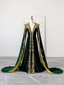 duplicated green dress with gold embroidery