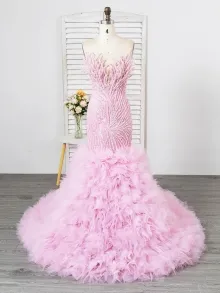 A pink fabric prom dress