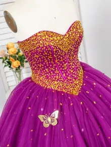 gold jewel and butterfly prom dress