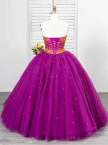 purple tulle prom dress with gold glitter