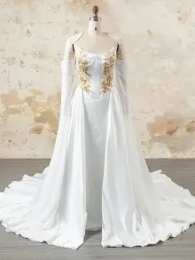 Lunss custom ivory wedding gown with detachable overskirt and sleeves