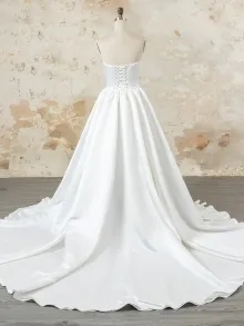 Lunss ivory wedding gown with detachable overskirt