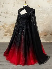 custom made black and red gown with cape sleeves