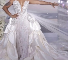 beaded wedding dress with plunge neckline