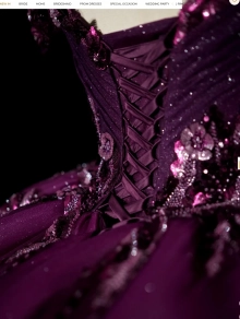 plum ballgown embelished with flowers and glittering fabric