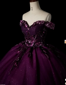 puffy plum ballgown with gems and flowers