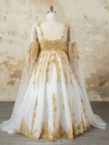 custom made Sun Queen ivory and gold fantasy ball gown