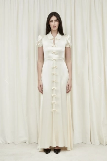 bridal dress with puff sleeves and bows