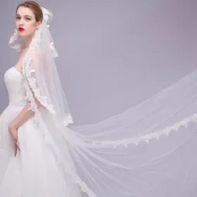 royal three tier lace applique decorated chapel length bridal veil