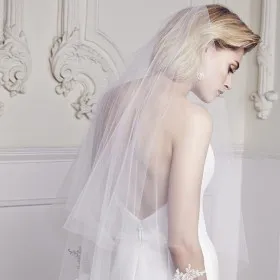 raw cut two tier veil fingertip length wedding veil