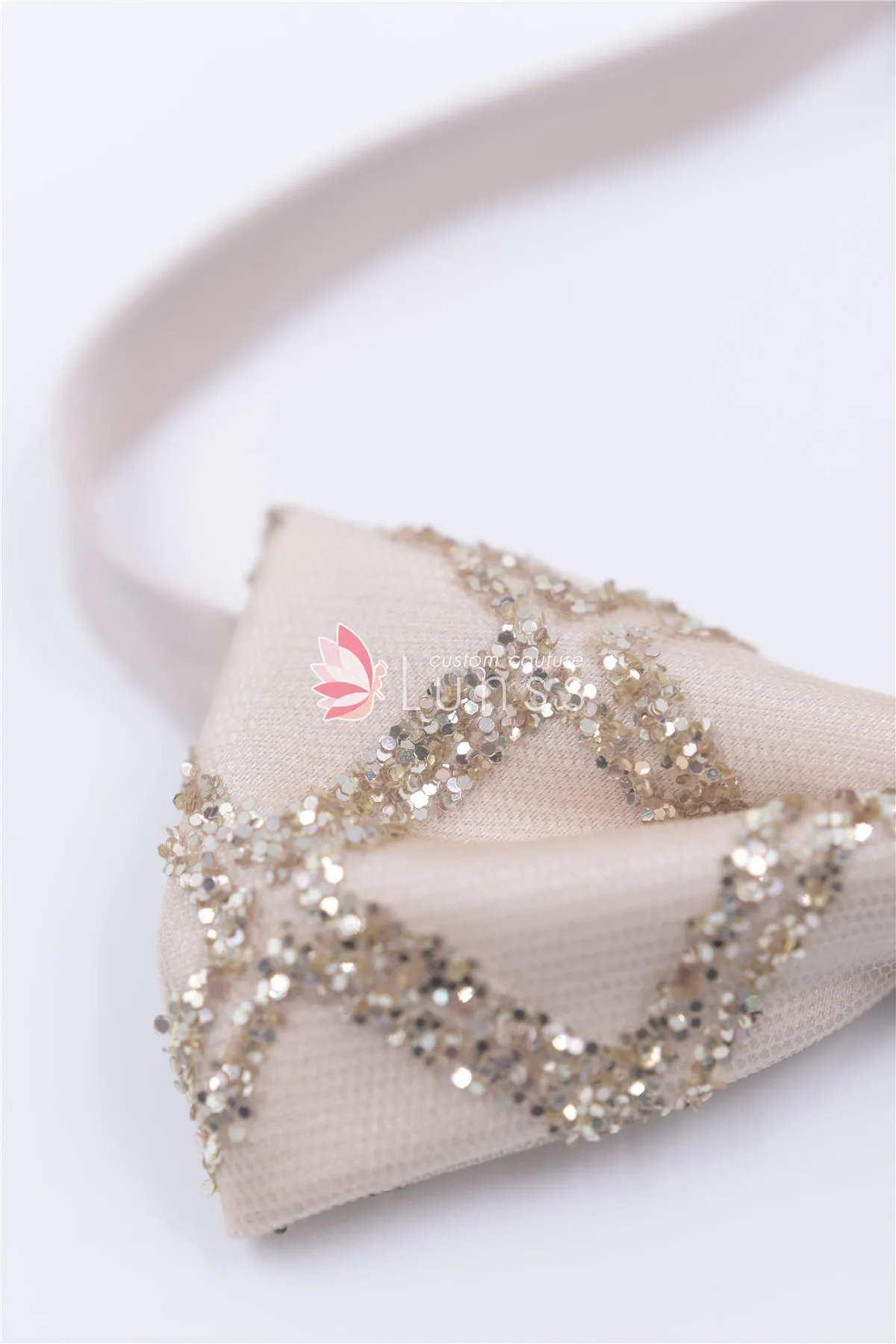 sparkly gold bow tie