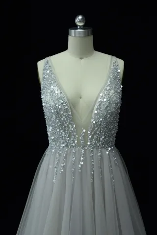 plunging V neckline pearled prom dress