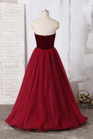 strapless dark red velvet and tulle prom gown