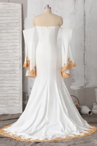 ivory jersey off the shoulder long sleeve prom dress with gold lace appliques