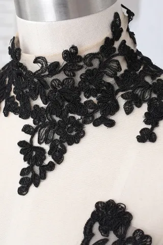 black lace appliqued dress
