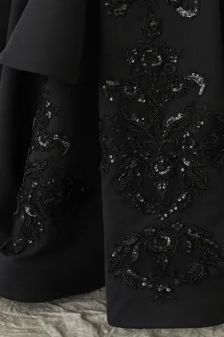 black godet dress with sequin appliques