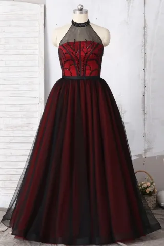 black beaded tulle overlay red underneath cute prom gown