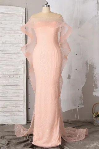 peach pink glitter prom dress with cascading ruffled cape