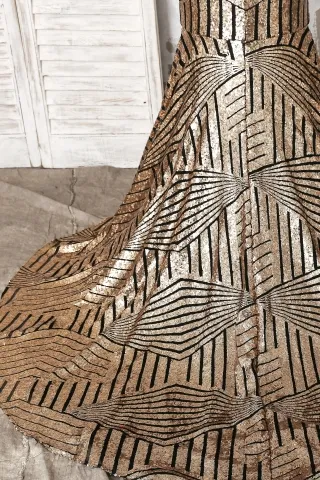 striped gold sequin with black mesh base dress