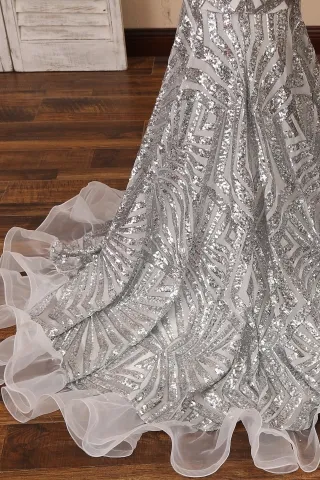 silver sequin with ruffled train prom dress