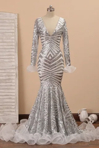 silver spider web sequin with ruffled trim prom dress