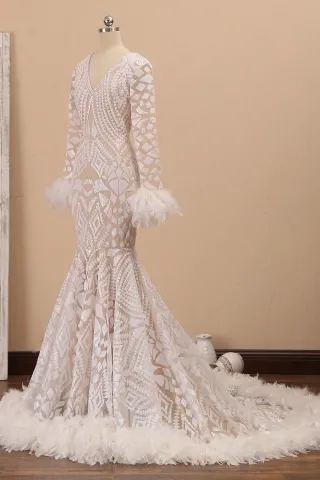 white sequin feather train prom gown