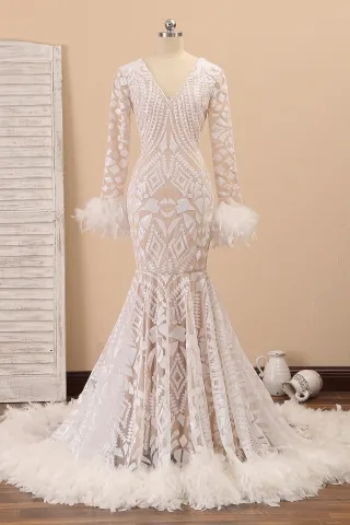 white sequin with feather sleeve and long train prom gown