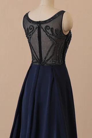 navy blue sheer back beaded prom dress