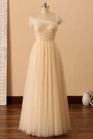 beaded tulle overlaid asymmetrical champagne prom dress