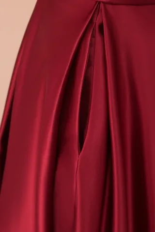 dark red satin strapless draped prom dress with pockets