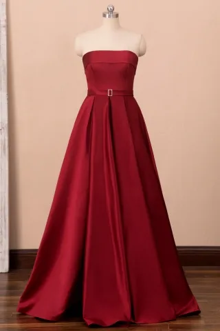 dark red satin strapless slit prom gown