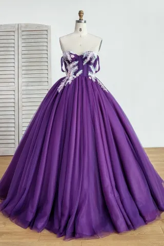 scattering feather appliqued purple tulle ball gown dress